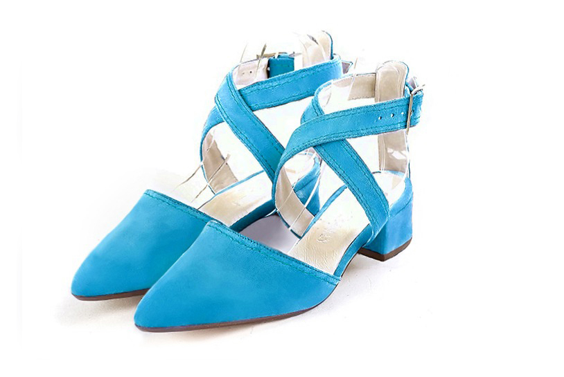Dress closed-toe heels crossed straps in turquoise blue leather with low flare heels and tapered toe - Front view